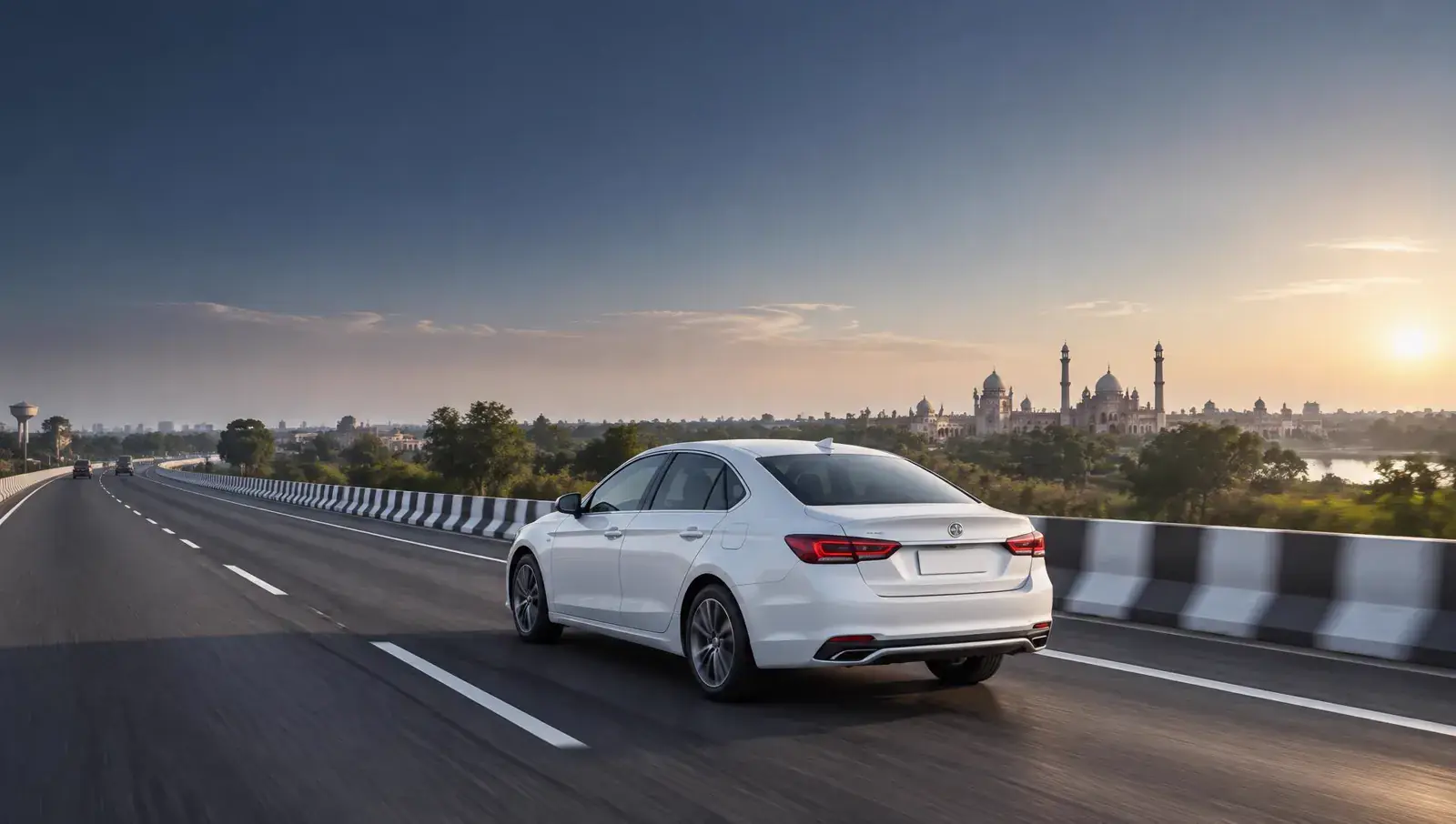 White sedan travelling on a highway outside Lucknow